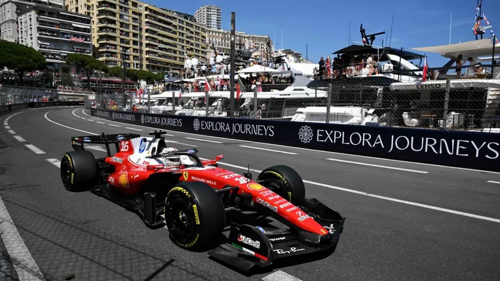 A Ferrari F1 car races through the streets of Monaco during a Grand Prix session