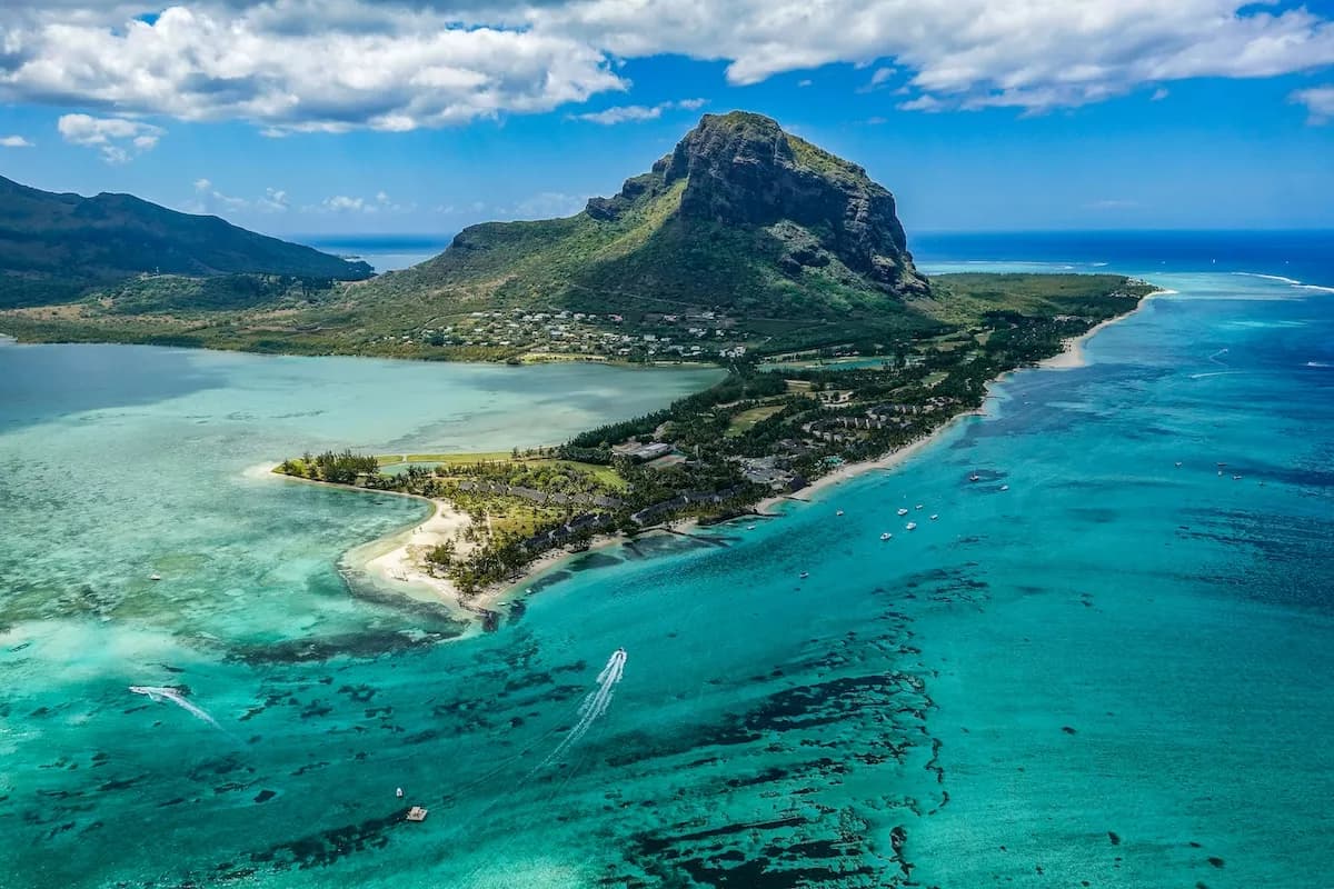 Aerial view of the Mauritius coastline with its turquoise lagoons and Le Morne Brabant